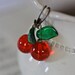 Vintage glass bead cherry dangle antique brass earrings red green sweet