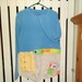Upcycled babydoll shirt or mini dress. So funky and fun, lots of hand appliques. Size M-L.