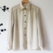 ReMade: Up-cycled Vintage cream oversized shirt with pearl beading detail on the collar and cuffs
