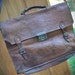 old leather schoolbag for notebook