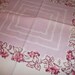 Vintage tablecloth with a grapevine theme in beautiful, unusual color scheme.