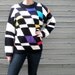 vintage 80s sweater with color blocks on abstract checker pattern. unisex size medium.
