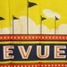 vivid yellow 1940's carnival poster "revue" sideshow