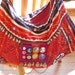 Embroidery bag with vintage tribal fabric, mirrors, shells and coins appliques