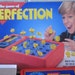 The Game of Perfection Get the Shapes in and Beat the Clock Great For Children with Special needs /