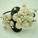 White flora howlite turquoise bagle