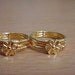 A pair of gold plated toe ring,adjustable
