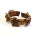 Leather flower bracelet with handmade leather flowers in camel color