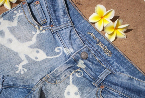 Hand bleached denim shorts with gecko design by reMusedClothing