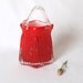 Crimson red handblown glass vase.