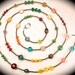 Long forty-eight inch beaded necklace with sterling Bali beads, vintage, filigree, turquoise, and crystal beads.