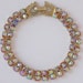 Exquisite Vintage Weiss Prong Set AB Rhinestone Gold Tone Double Strand Bracelet Signed Champagne Pink Hues Rhinestones Excellent Condition