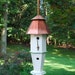 Grand Estate garden bird house with copper roof