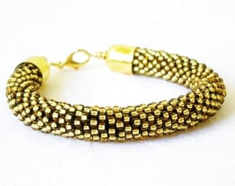 Golden jewelry/Golden bangle/High fashion Bracelet//Beaded rope bracelet/Crocheted bangle