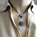 TIBETAN double terminated Crystal pendant w/ inclusions.