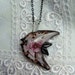 Angel fish necklace, murano lampwork pendant is angel fish shaped with gorgeous flower inside in pinks and golds.