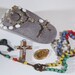 lot of religous items Altered Art rosary medals