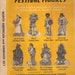 FESTIVAL FIGURES published by UNICEF in 1978. These are 13" high cardboard cutouts of Children From Around the World in Holiday Dress