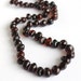 Baltic Amber Baby Teething Necklace. Dark cognac color beads.