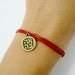 Love Bracelet - red cord bracelet. Bronze charm with the hebrew letters for LOVE, judaica bracelet, with extension, gift for her
