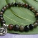 Scapolite Bracelet for Problem Solving with Chakra OM Charm