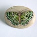 green butterfly handpainted porcelain brooch, on "parchment"color background spring celebration gift idea