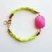 Neon bracelet with hot pink faceted gemstone