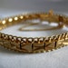 Classic Textured and Etched Gold Tone Bracelet with Chain Guard - Unsigned - Vintage 1960-1980