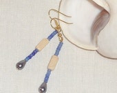 Earrings of blue Czech glass beads with hematite and wood