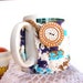 100% Cotton Purple and Teal crocheted Mug Hug cozy with coaster bottom, wooden button