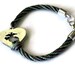Marine in her heart bracelet - kumihimo braid - carved pewter