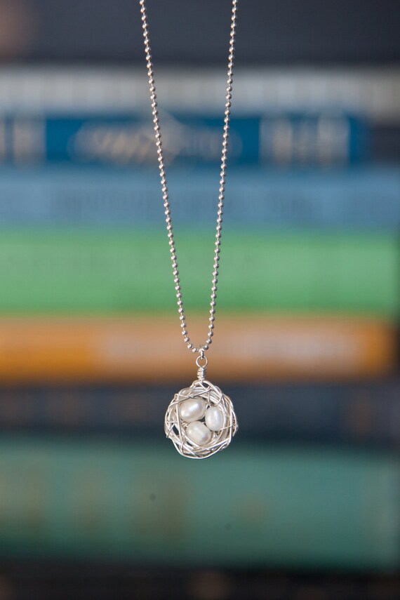 Items similar to Silver Bird Nest Necklace with Pearl White Beads on