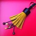 black and moustard handmade leather keychain