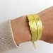 Gold feather cuff bracelet. Gold brass chain. Big bracelet. Cuff bracelet