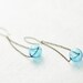 Long chain earrings with blue handblown glass sphere bead