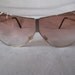 Giani unique Gold sunglasses with peach fade lenses with metal detailing corner of each eye Classic 1980's