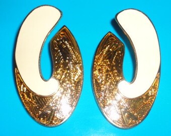 Funky gold long Swirl Berebi Earrings ***