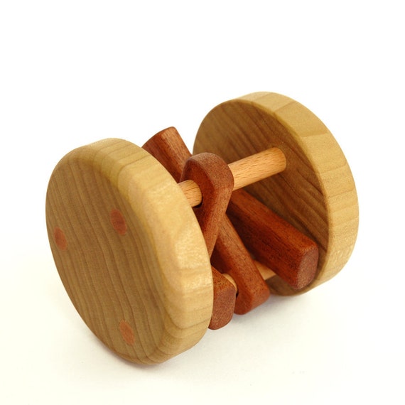 Wooden baby rattle - rolling and knocking toy