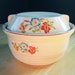 Homespun, Rustic and Warm-Feeling Universal Pottery Covered Casserole Dish from the 1930s in Red, Blue and Yellow Flowers