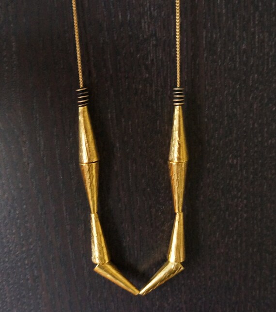 Items similar to Gold Cone Necklace on Etsy