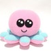 Stuffed octopus baby toy made with pink and turquoise fleece