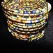 RESERVED for Sherri Multicolored Beads and Goldtone Beads, 2 inches wide, Stretches to fit wrist, Statement Piece