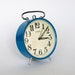 Vintage German mechanical alarm clock from Ruhla. Blue. Made in GDR (East Germany).