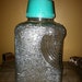 Textured 2 Quart clear glass refrigerator jug, teal cap and spout