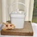 White ceramic small lidded basket with handle