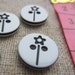 10 White and Black Buttons with Laser-cut Daisy Wand Design 13mm