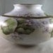 Hand painted double violets on porcelain vase with decorative gold band