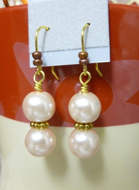 Items similar to Dinner and a Show, glass pearl earrings on Etsy