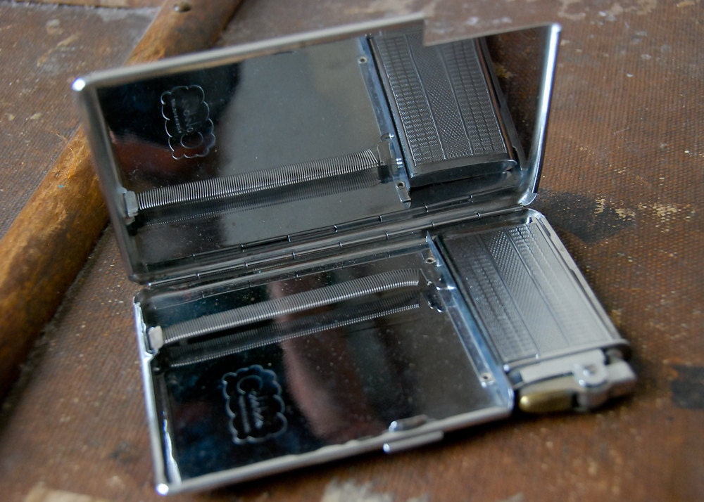 vintage cigarette case and lighter combo by humanachievement