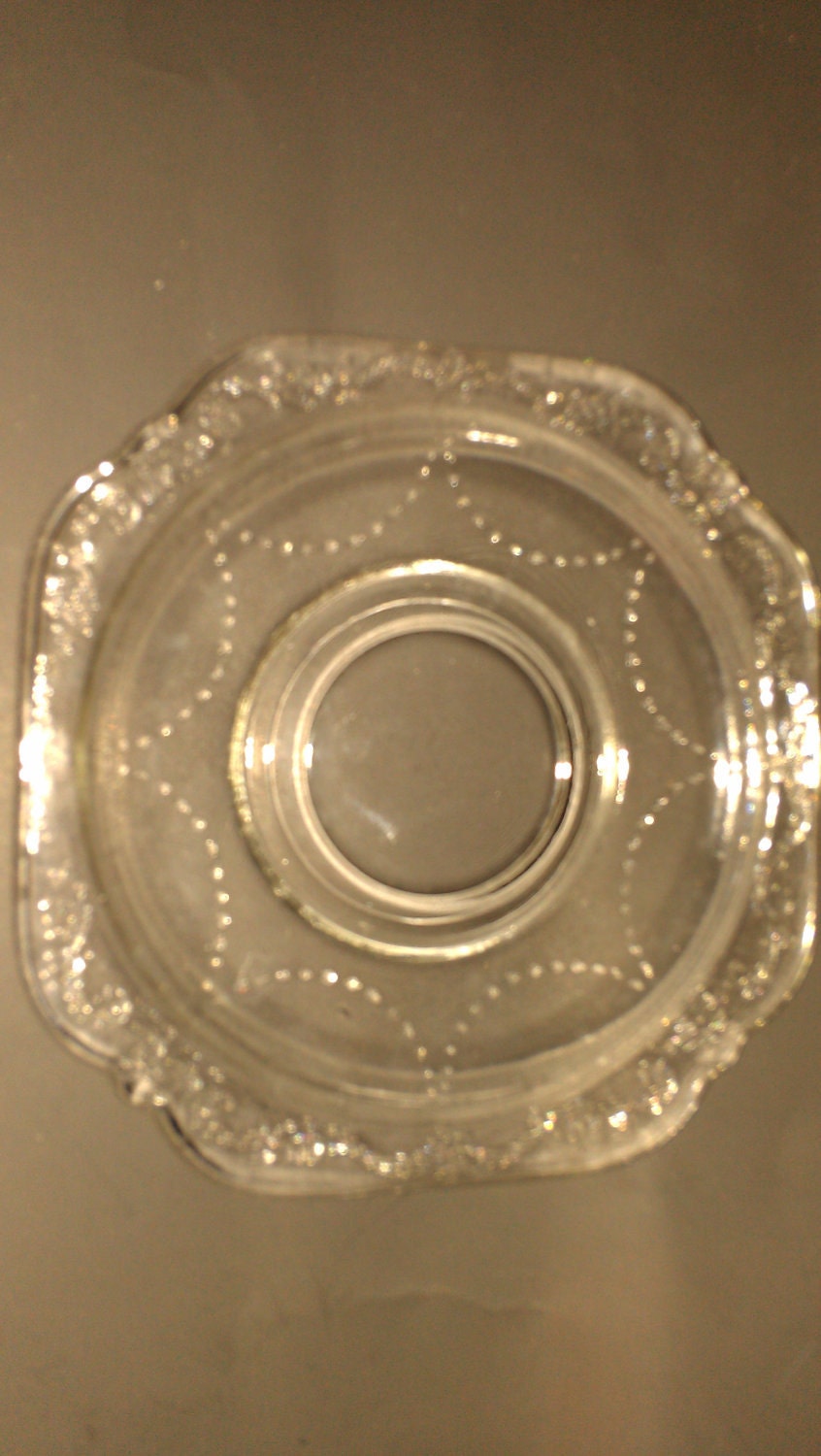 Clear glass tea cup and saucer set Madrid pattern